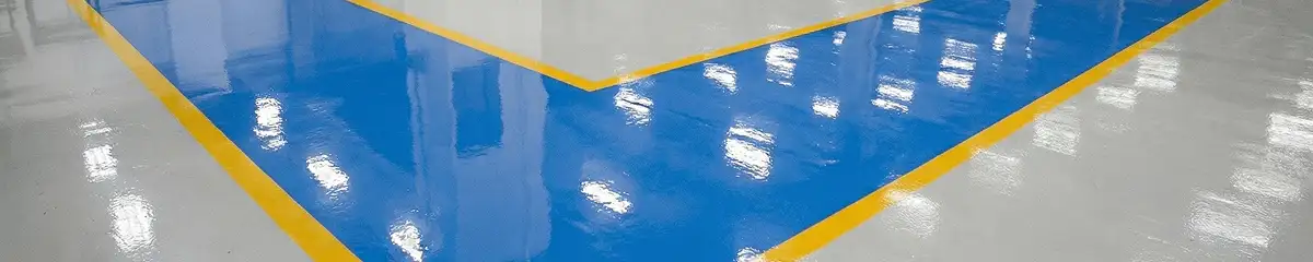 A factory floor professionally covered and marked with epoxy flooring in Richmond, VA
