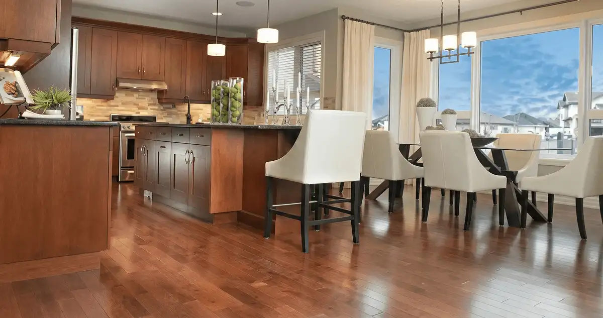 A modern kitchen with professionally installed wood flooring in Richmond, VA