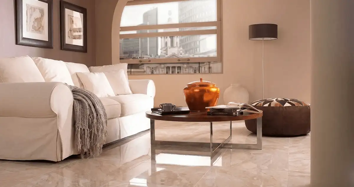 Modern living room with professionally installed marble flooring, a beige sofa, coffee table in Richmond, VA